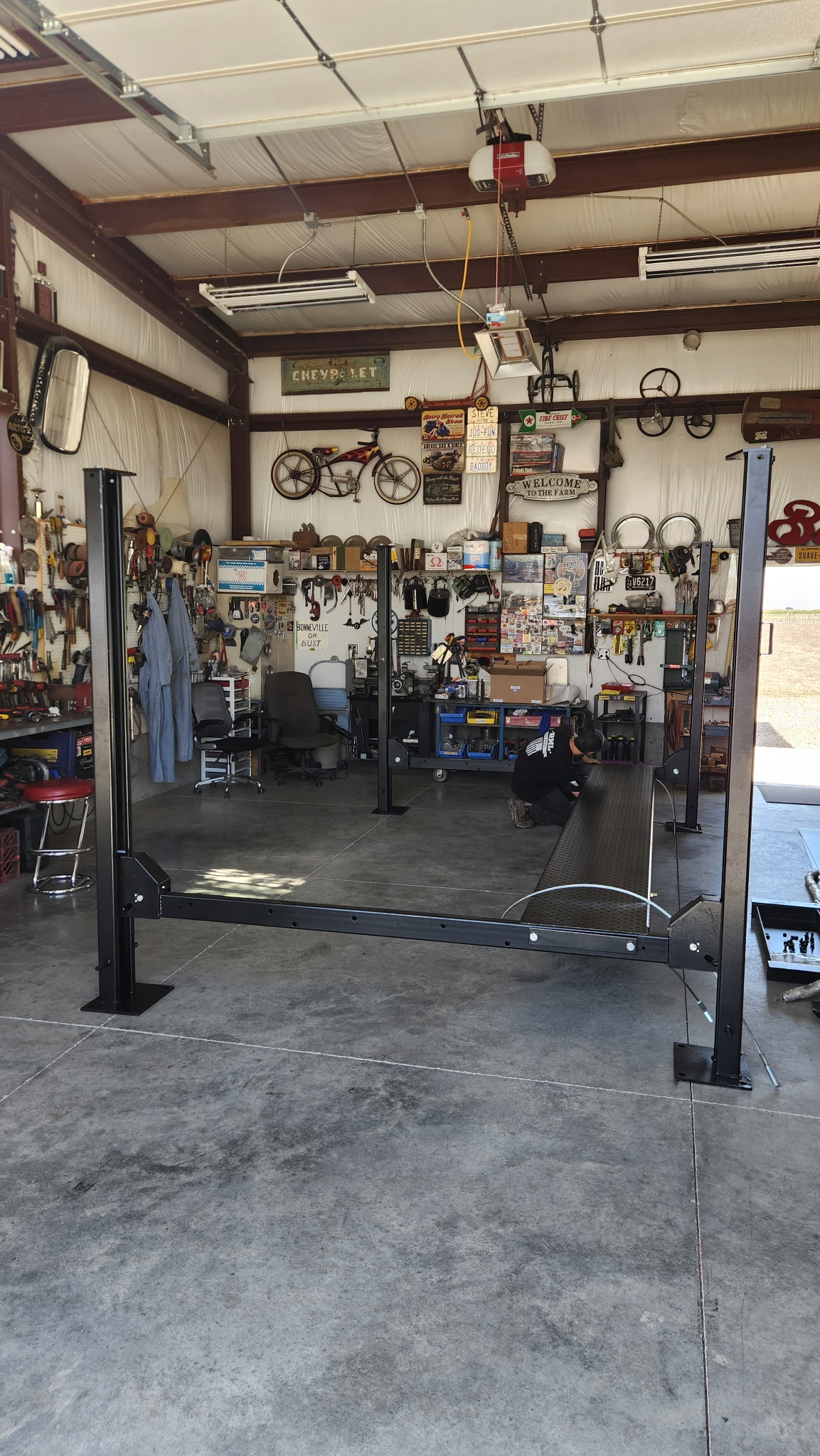 RML technician completing a Tuxedo FB8K home garage lift installation