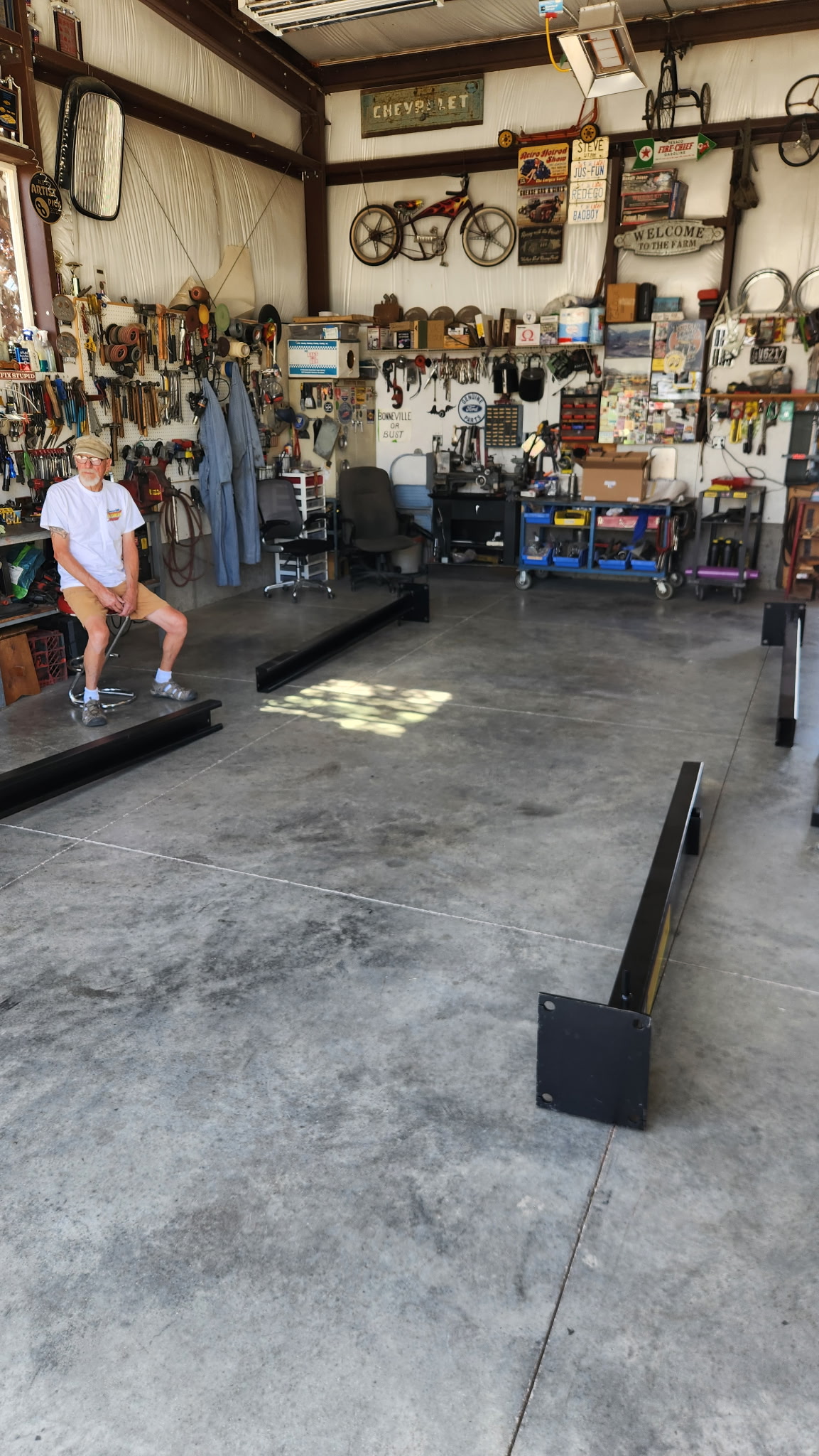 Tuxedo FB8K lift components laid out in a home garage